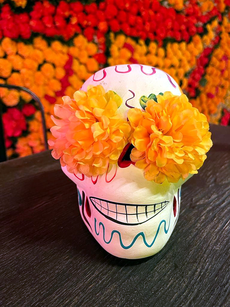 Calaverita con cempasúchil